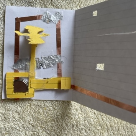 the wiring and stuff for the dragon. The tinfoil seemed to have better conductivity than the copper tape but it still was not great. I taped down all the connections which helped things not move but I still had to press down on each light to get them to connect and light up.