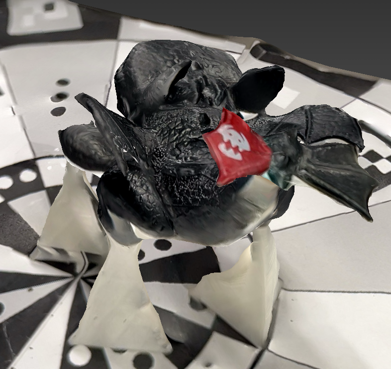 another scan of a different toothless, this one went relatively well but the bottom took on the texture of the floor beneath it so he looks a little more like a night-light, which is a mix of a black and white dragon of the species that toothless is.